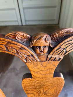 Antique Oak Chair with Carved Cherub Back