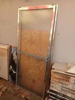 ALUMINUM TUB OR SHOWER DOORS