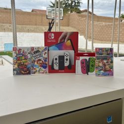 Nintendo Switch Oled With Extra Controllers And 3 Mario Games