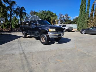 FORD F150 XLT,LIFTED!CLEAN TITLE+SMOGGED,2027 JAN TAGS,RUNS GREAT