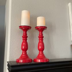 Two Red Metal Pillar Candle Sticks