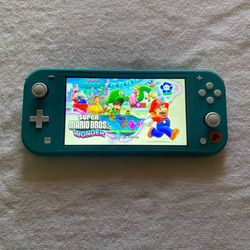 NINTENDO SWITCH LITE with 100 SWITCH GAMES + 7000 RETRO CLASSIC GAMES