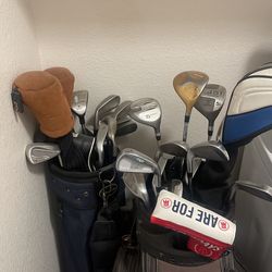 assorted golf clubs and bags