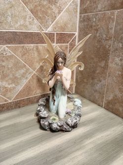 Fairy Figurine with Wings and Flower