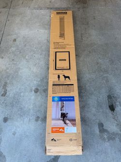 Dog door for sliding door