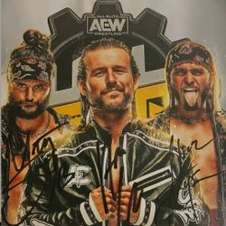 Autographed 8x10 (Adam Cole & Young Bucks