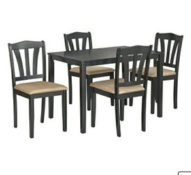 New in box dining table with 4 chairs see pictures for dimensions
