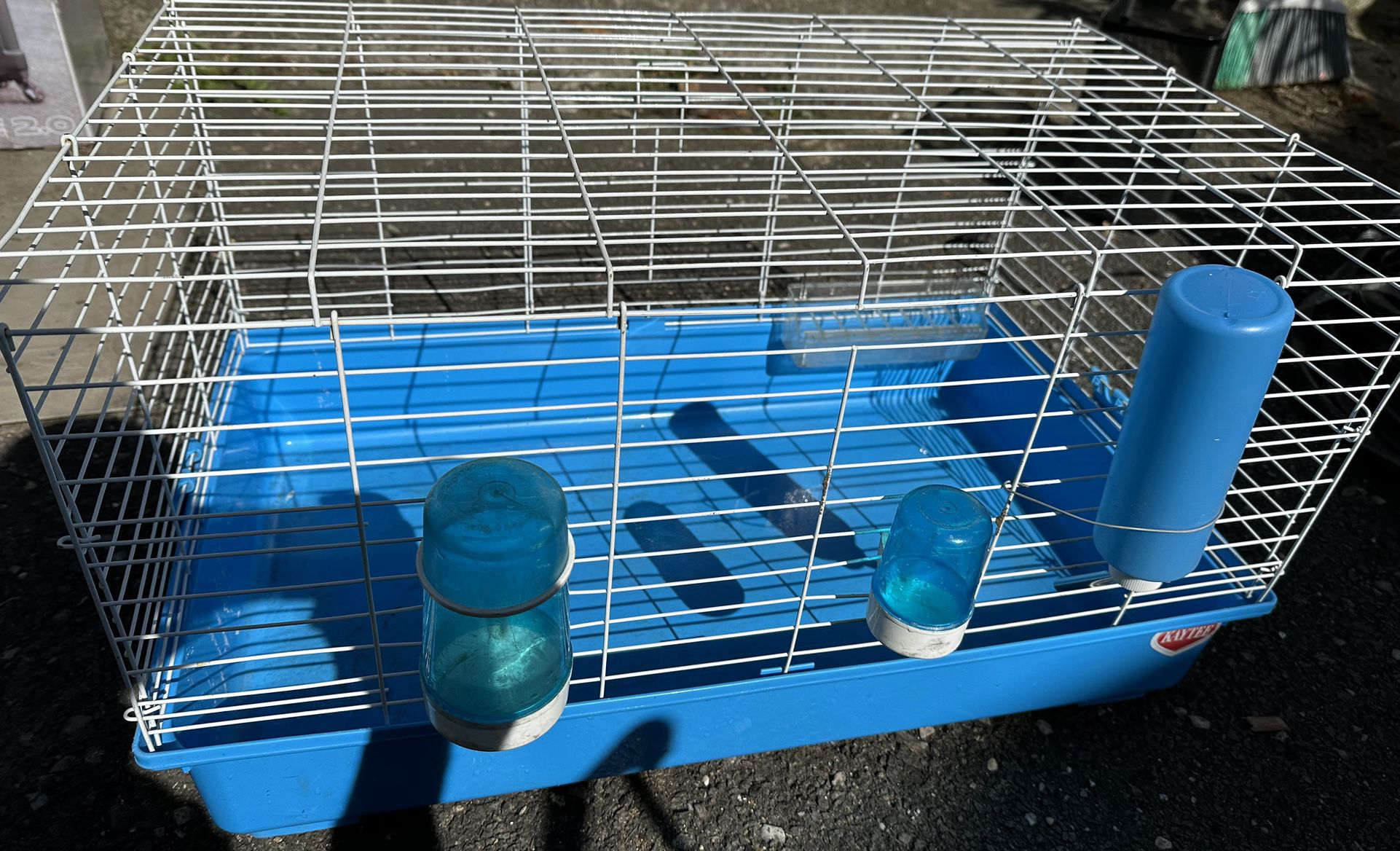 Small Pet Cage With Water Spouts And Feeder. 