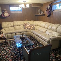 Leather Sectional With The Pull Out Bed Inside . Barely Used 