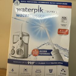 Waterpik Ultra Water Flosser (WP-100) brand NEW unopened