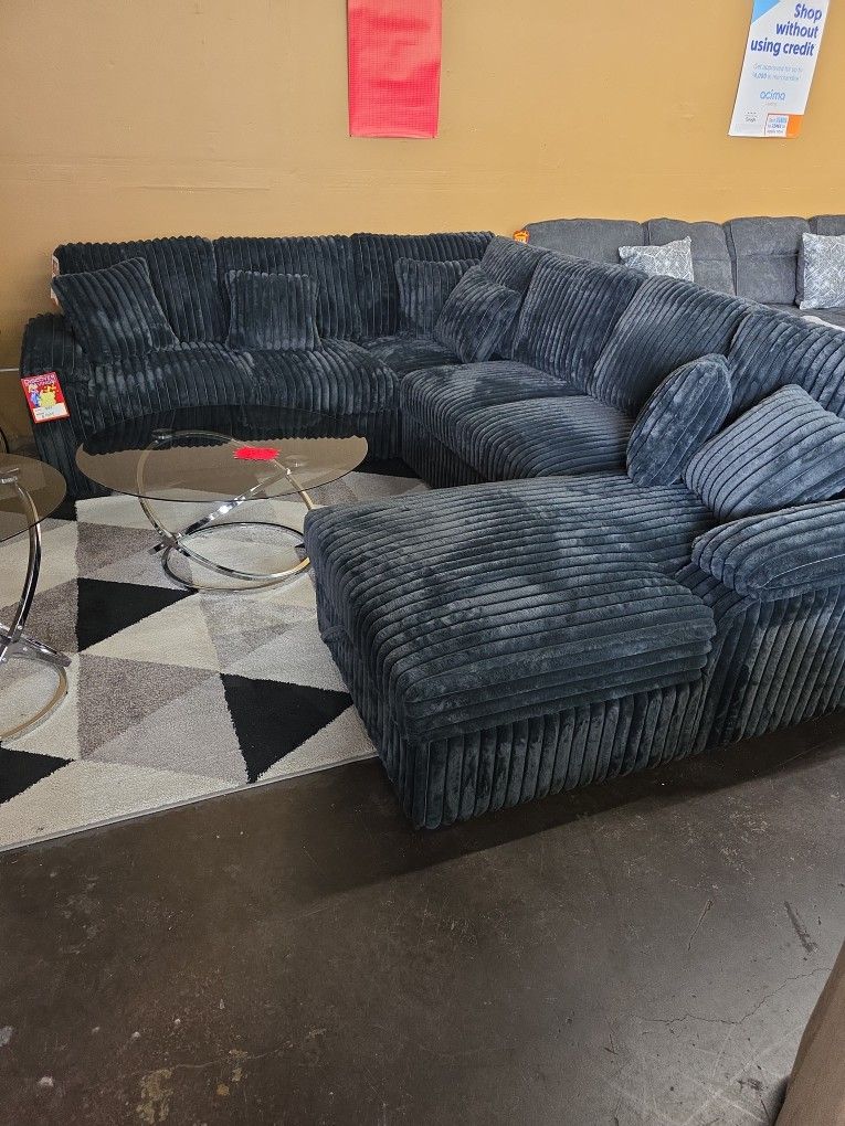 Plush Thick Corduroy Sectional With Pullout Bed And Storage Chaise