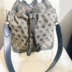 Vintage Dooney & Bourke monogram drawstring bucket bag