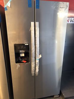 New scratch and dent whirlpool 25 cu ft side by side stainless steel fridge. 1 year warranty