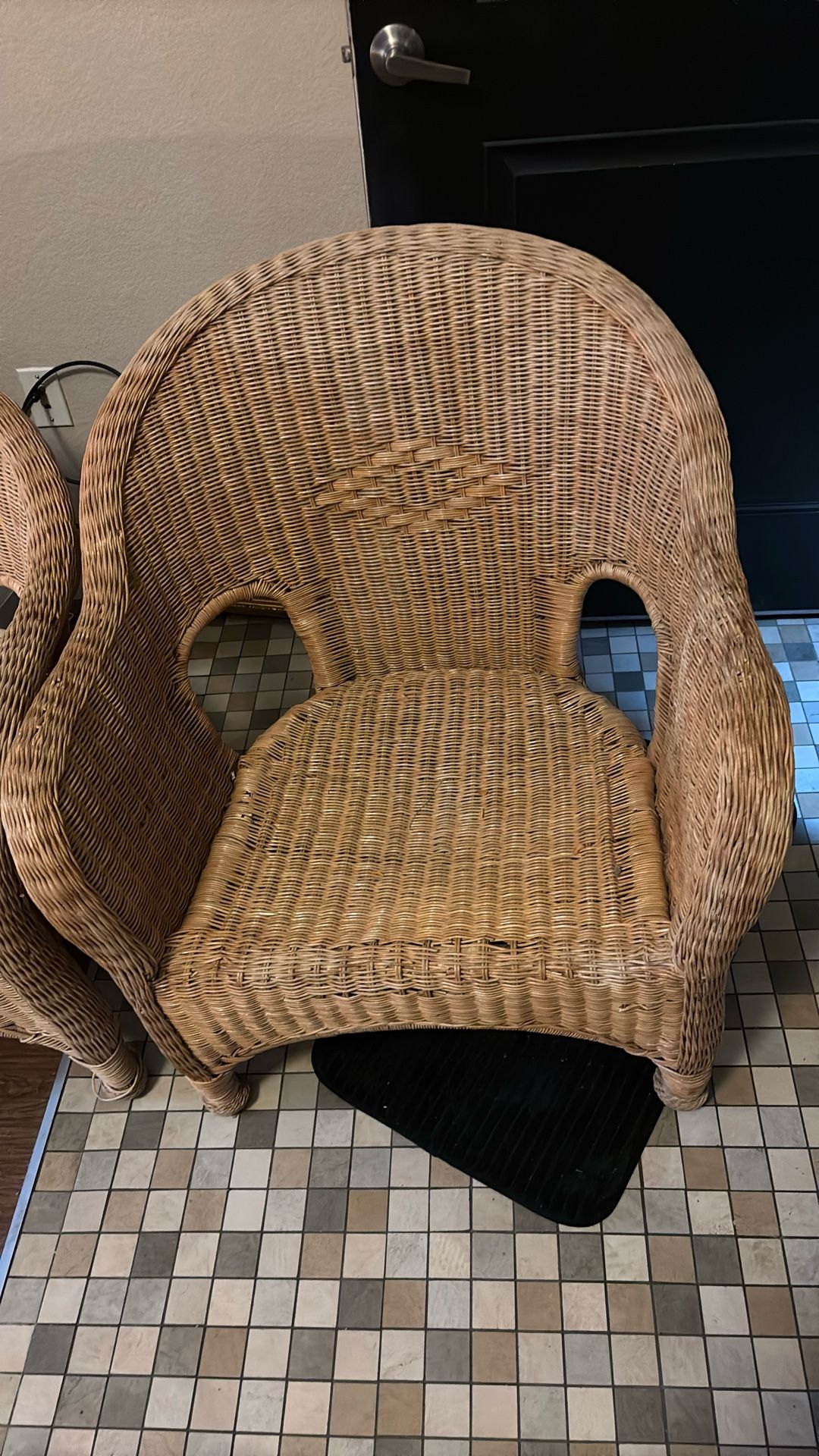 A Set Of Wicker Chair And A Little Couch