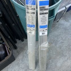 Frost King aluminum saddle threshold.