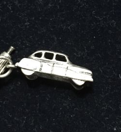 Silver car charm