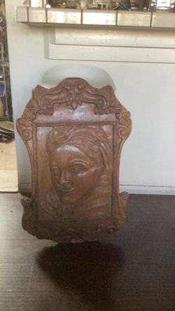 Hand carved portrait of Jennifer Lopez