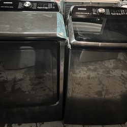 Samsung 5.5 Cu. Ft. Top Load Washer and Electric Dryer Laundry Pair in Black.