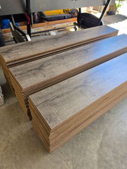 250ft² of Beautiful Gray Laminate Floors