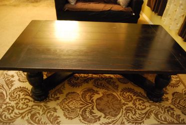 Dark Wood Coffee Table with Carved Legs