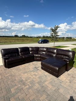 Leather sectional couch. Delivery available