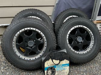 Studded snow tires and wheels