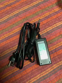 Computer charger: AC adapter for use with Lenovo laptop