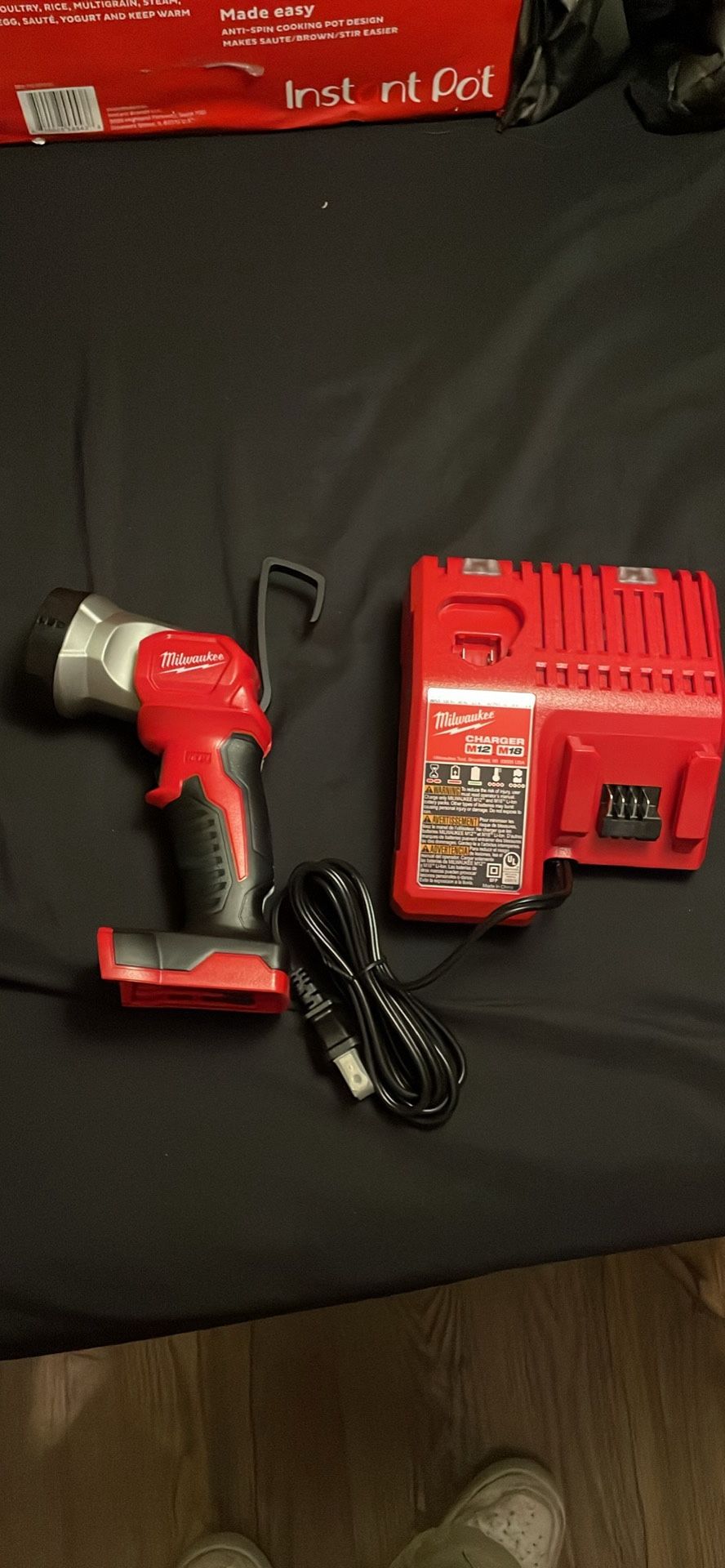 New Milwaukee Light And Charger