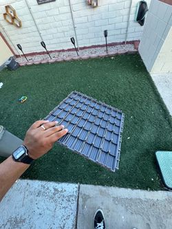 325 waterproof interlaced gray tiles 12 x 12 for terrace, patio, porch. Used as new at $450