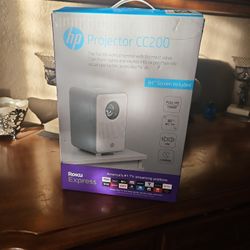 HP Projecror NEW In Box. With Roku & Screen