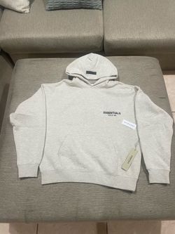 Light oat essentials hoodie size S,M