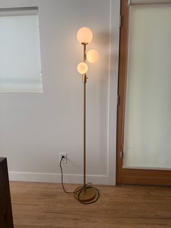 Gold floor lamp
