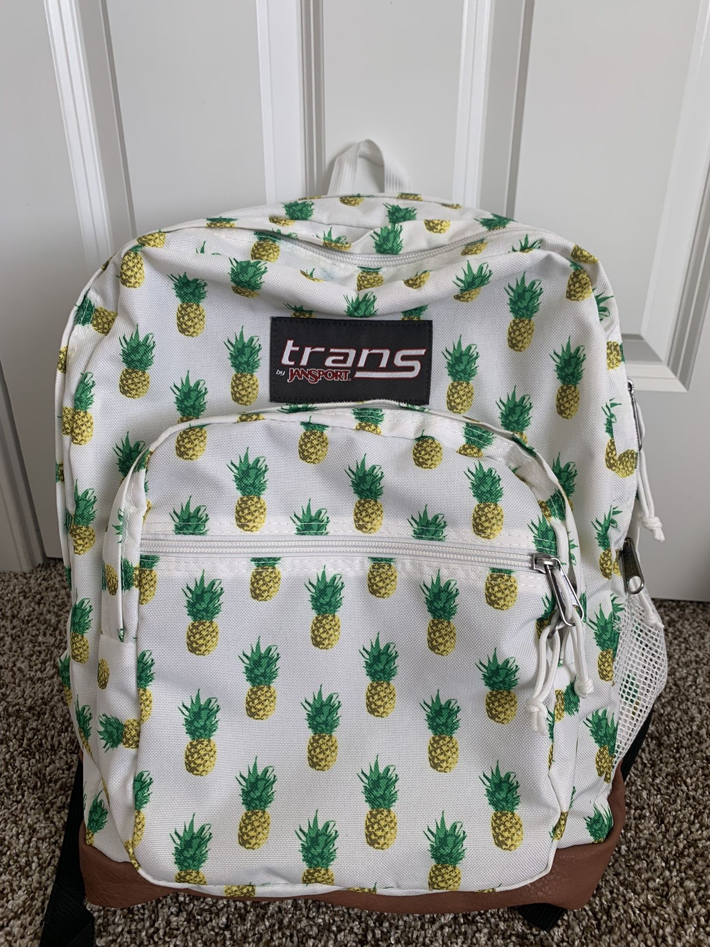 Jansport Superbreak Backpack - Pineapple with brown leather 