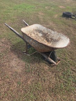 Free wheel barrow , tire, bricks and roof shingles dif colors