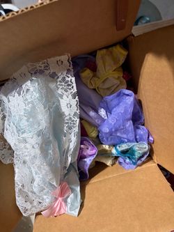 Box of Barbie clothes