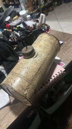 Vintage small fuel engine fuel tank.