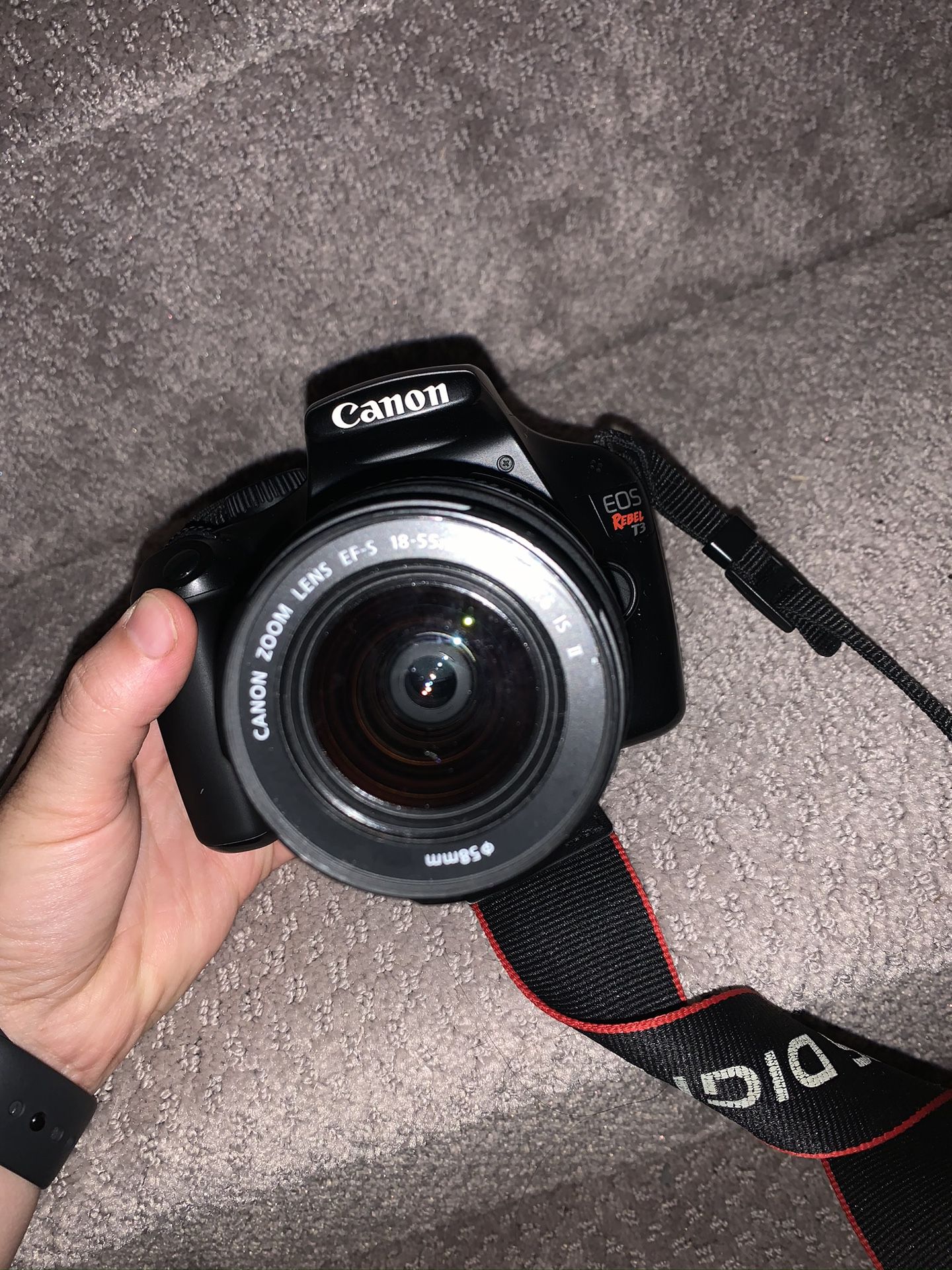 Canon Camera with Charger, Zoom Lense, and Carrier