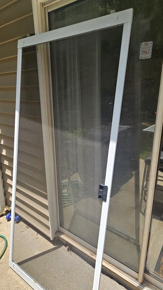 screen door and chairs