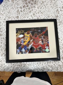 Signed magic Johnson and Michael Jordan