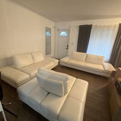 Carlo Perazzi Furniture Collection modern white leather 3-piece sectional (sofa + loveseat/section + chaise) in decent used condition.