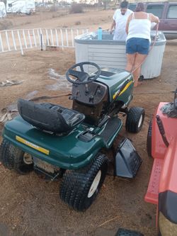 Sit down lawn mowers