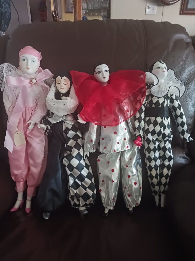 4 Vintage Jester Harlequin Posable Porcelain clown dolls.
