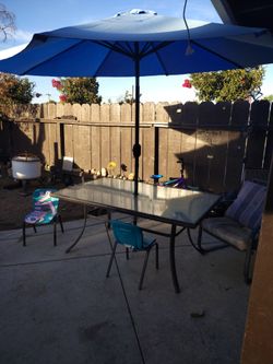Glass patio table / Umbrella