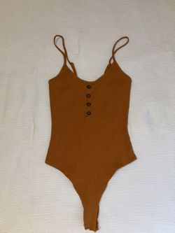 sky and sparrow / burnt orange ribbed henley bodysuit