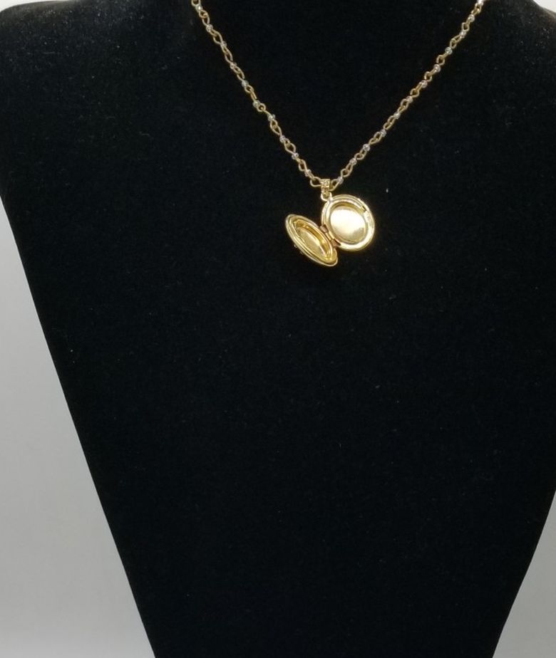 Gold floral locket necklace