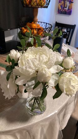 Artificial flowers in vase