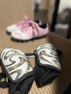 Puma Cleats And Shin Pads For Soccer.