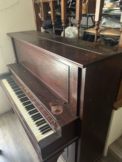 Lyon and Healy upright piano.