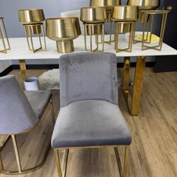 Grey Chairs And Two Tables 