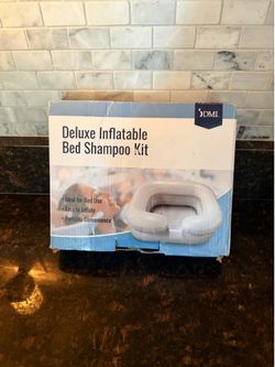 Inflatable hair washing basin for bedridden disabled
